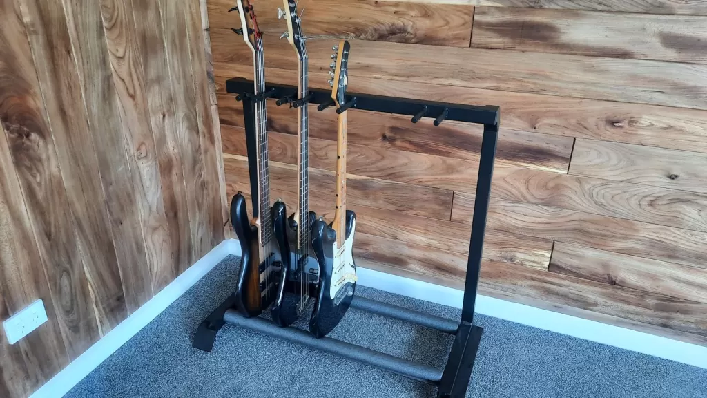 Custom welded aluminium stand holding four guitars