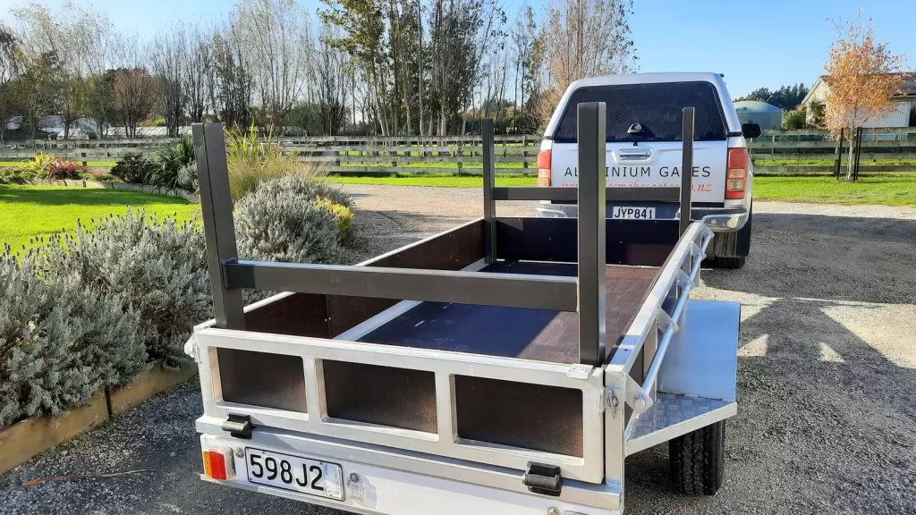 Removable aluminium H-bars fitted to a trailer for carrying long lengths