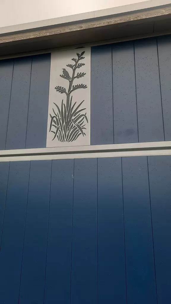 Pole shed closed in with aluminium panels and a sliding door